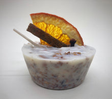 Load image into Gallery viewer, fire starters made from recycled wood shavings wax and essential oil decorated with orange and cinnamon