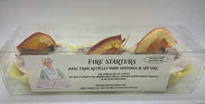 fire starters made from recycled wood shavings wax and essential oil decorated with orange and cinnamon